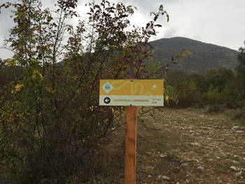 A sign on the mountain, which writes